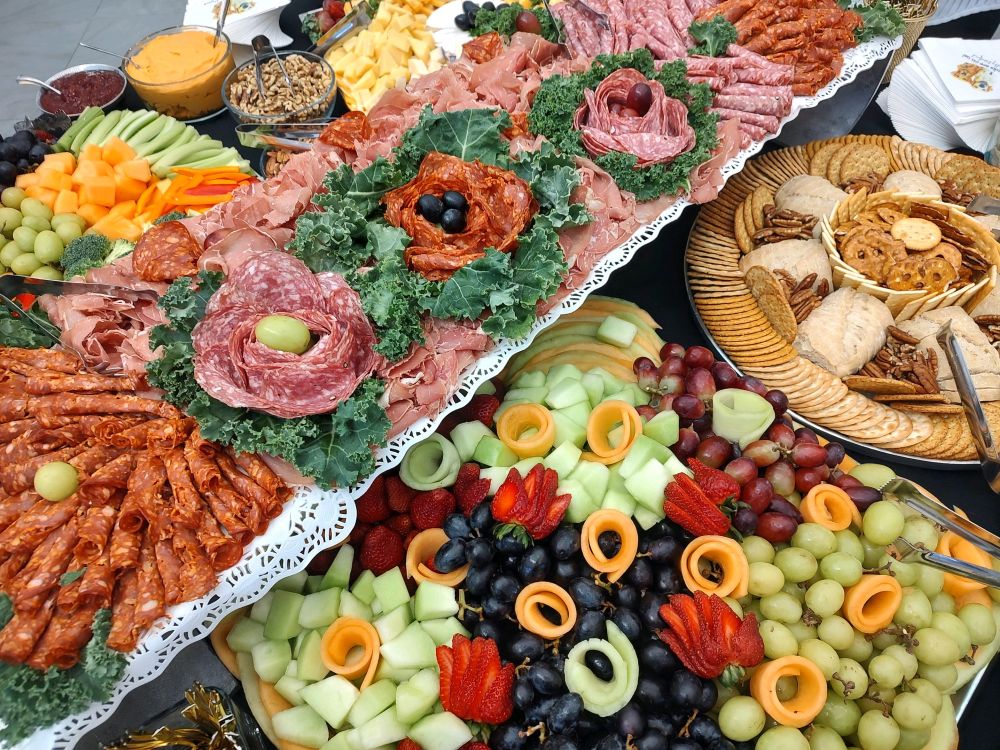 Hero 3-shopped Charcuterie spread with cheese, fruit, and meat from Thompson Event Catering
